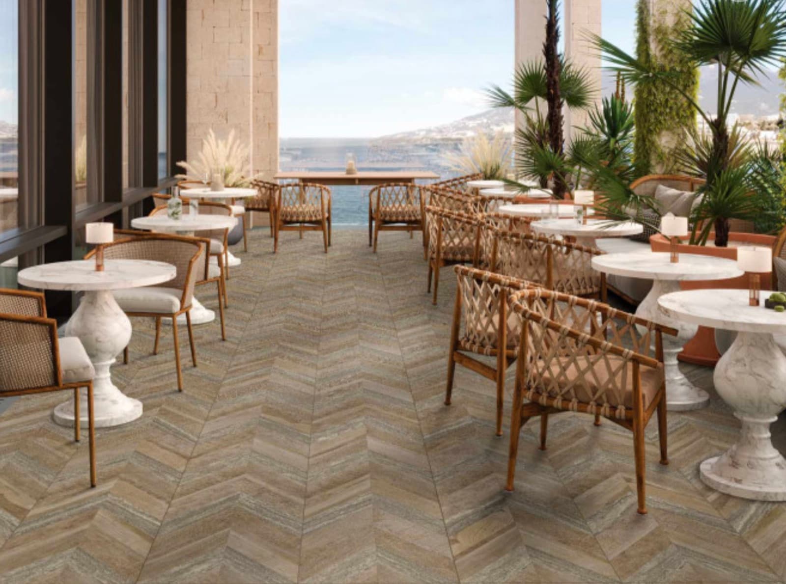 Terras met Aparici Chevron Oak Stamp tegels in visgraatmotief