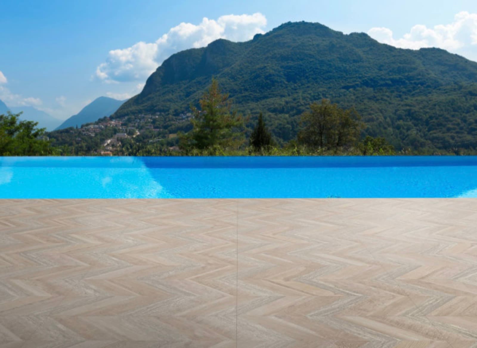 Terras met Aparici Chevron Oak Stamp tegels in visgraatmotief