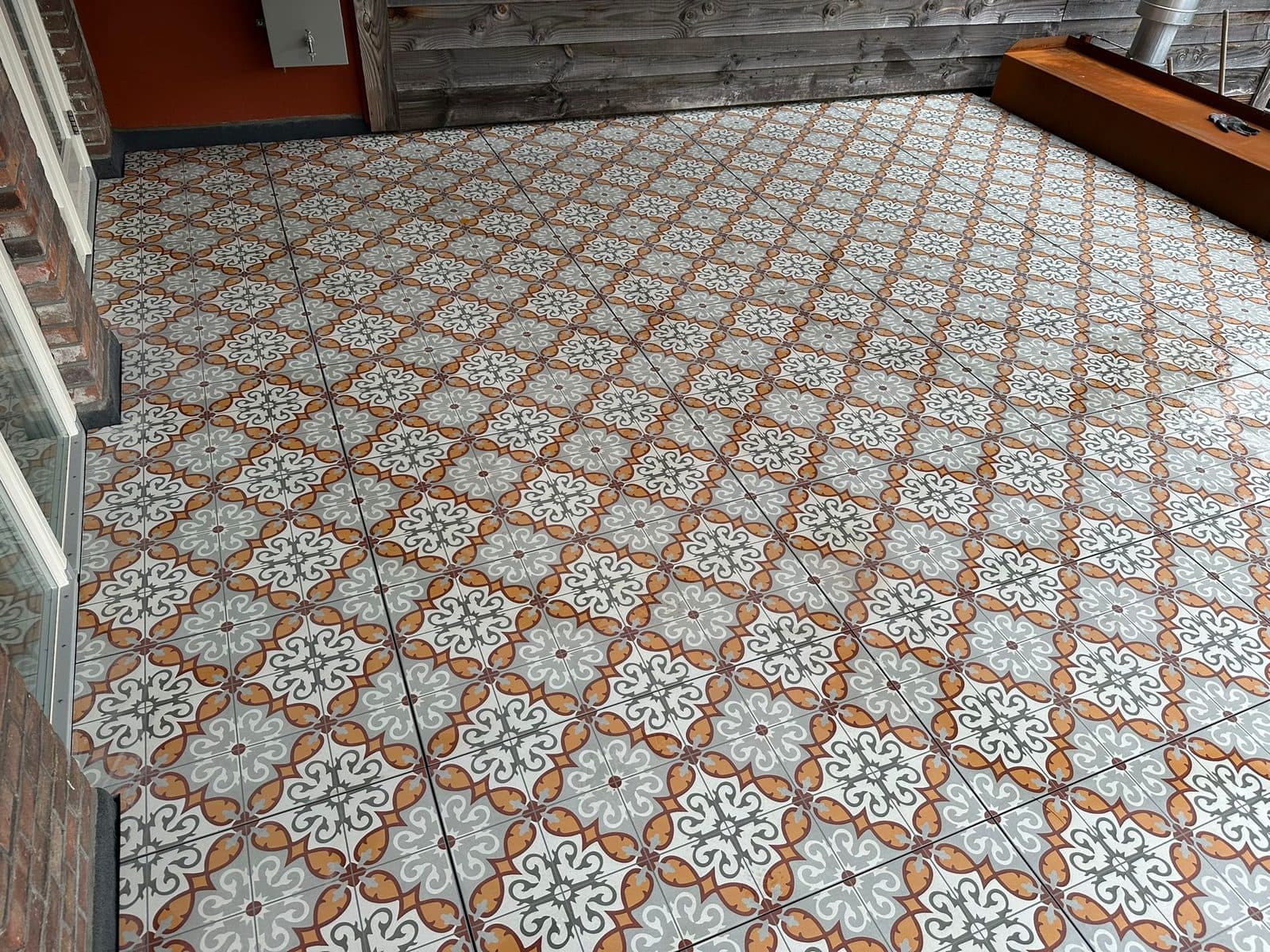 Dakterras Amsterdam Jordaan met decortegels, projectfoto